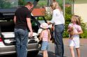 family-near-car