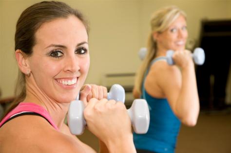 women-lifting-weights-together