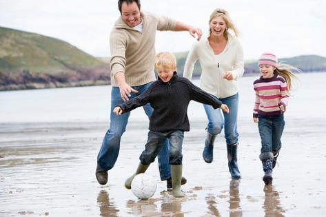 family-playing-football