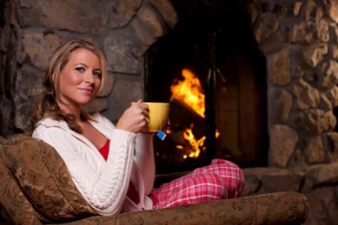 woman-relaxing-fireplace