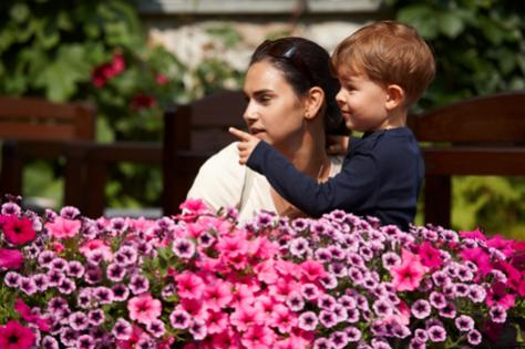 mum-boy-outdoors-flowers