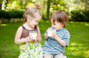 two-children-drinking-milk-low