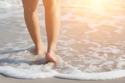 woman-walking-beach