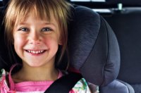 happy_girl_in_car_seat